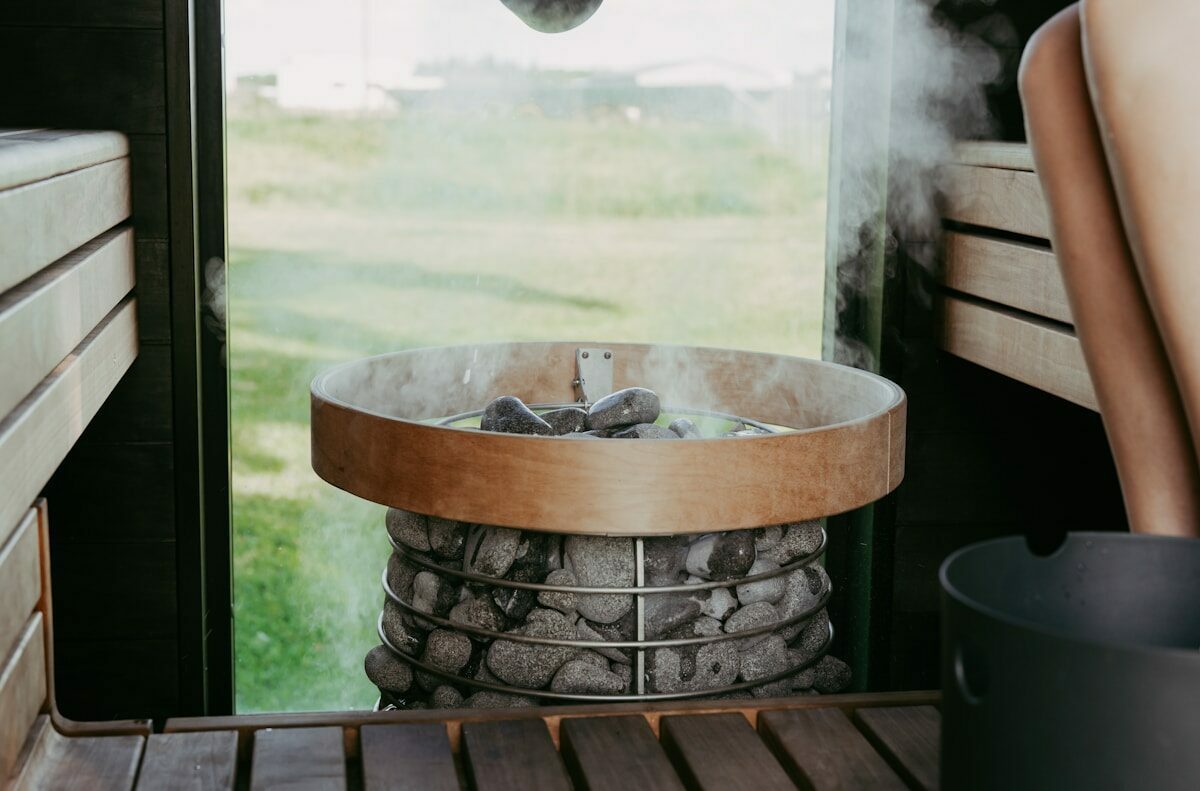 Steam rising from hot stones in a sauna